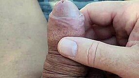 Amateur guy masturbates solo and naked in the shade on a sunbed.