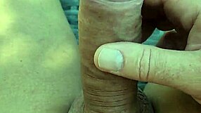 Amateur guy masturbates solo and naked in the shade on a sunbed.