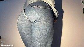 The cute girl next door desperately pees her jeans in a homemade solo moment.