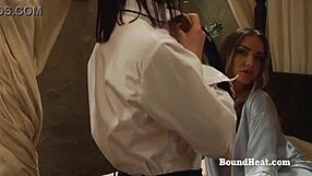 The busty pale lesbian slave with big natural tits gets bound and whipped hard.