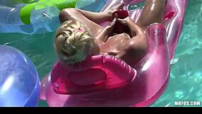 sexy bikini-clad blond with perfect ass strips down and relaxes outdoors