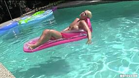 sexy bikini-clad blond with perfect ass strips down and relaxes outdoors