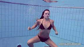 Does Lucy Really Remove Her Bikini While Swimming in the Pool?