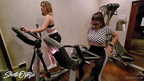 lesbian blondes and brunettes heat up gym then fuck big tits in bathroom steamy session