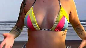 beach girl grabs waiter's hard cock bulge to feel