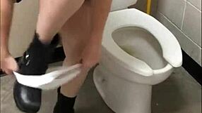 pretty brunette sneaks pees in bathroom while teasing her perfect ass