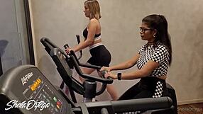 lesbian blondes and brunettes heat up gym then fuck big tits in bathroom steamy session