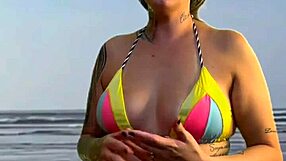 beach girl grabs waiter's hard cock bulge to feel