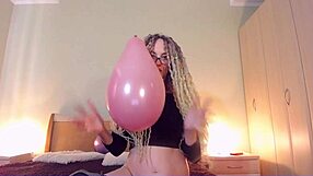 curvy mommy with huge tits pops balloon in wild fetish play
