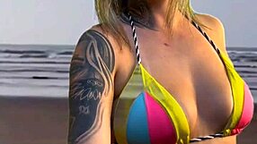 beach girl grabs waiter's hard cock bulge to feel