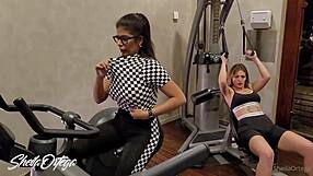 lesbian blondes and brunettes heat up gym then fuck big tits in bathroom steamy session