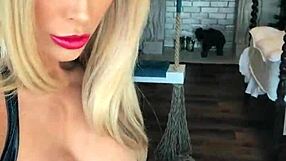 Wetlook suit clings tight as leather boots tease hidden curves in sultry display.