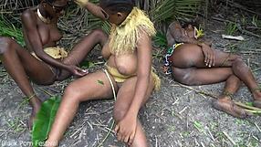 Three native African girls finger and lick each other's wet pussies outdoors. Skinny beauties moan in lesbian play under the sun.