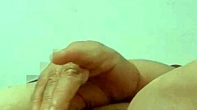 Grandma sneaks cucumber into mature pussy