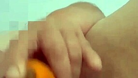 Grandma sneaks cucumber into mature pussy