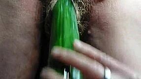 granny shoves cucumber deep in hairy wet pussy!