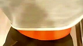 Hey, watch her grind and shake that ass perreando right in the kitchen