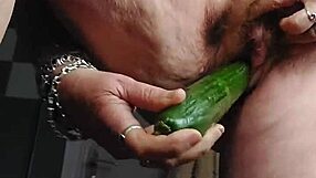 granny shoves cucumber deep in hairy wet pussy!