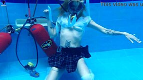 ashlee rose shakes skinny big tits in school skirt underwater scuba dive