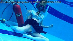 ashlee rose shakes skinny big tits in school skirt underwater scuba dive