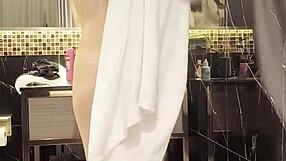 japanese slender dries hair post-bath showing off small tits and legs