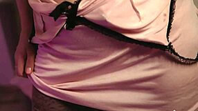 busty beauty stuffs flask soap bubbles into wet pussy hole