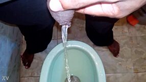 Boy Pees While Black Man Pisses in Urination Scene