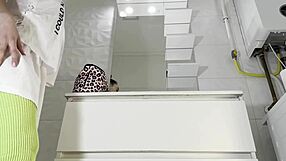 Sexy college brunette lifts mini skirt in bathroom flashing panties and socks