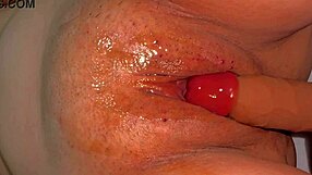 amateur's tight pink pussy close-up 344 days after losing virginity to dildo