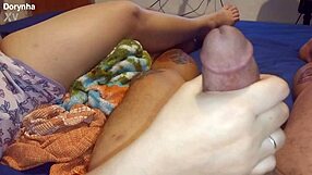 dorynha's brazilian bdsm slave handjobs her master's cock daily in shorts