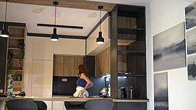 Redhead wife models new white miniskirt and pink panties before stripping