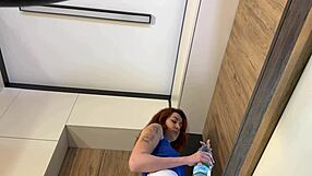 Redhead wife models new white miniskirt and pink panties before stripping