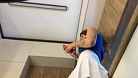 Redhead wife models new white miniskirt and pink panties before stripping