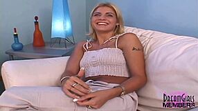 blonde smokeshow marcelis bares shaved pussy on sofa