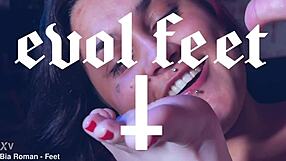 Naughty redhead femdom forces brunette slave to lick bound feet toes