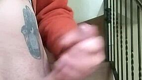 stroking my huge cock in apartment stands while neighbor chats garage below