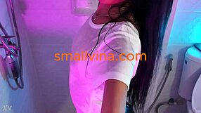 Petite Asian Babe Strips Wet And Naughty