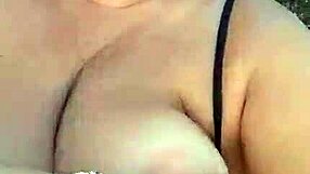 😍 Mature blonde milf flashes huge natural tits big nipples and pussy lips on beach 👙🌊