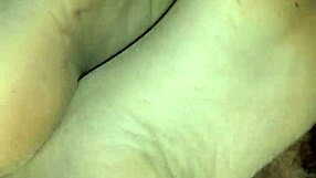 my girlfriend gives homemade sensual footjob teasing toes in tan stockings