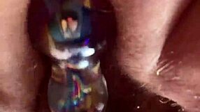 getting super close to this curvy hairy pussy sliding in glass dildo nice and slow