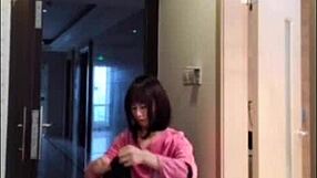 asian ladyboy strokes her cock flashing for woman