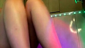 hey watch this squirting whore finger her wet pussy through pink leggings up close