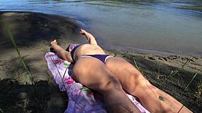 check out this milf's hairy pussy up close in bikini by the river outdoors