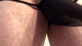 Sun692 Black Lingerie Teases Ass with Butt Plug Closeup