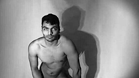 Bodybuilder strokes monster cock in hot grayscale solo