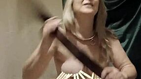 Watch this chained French maid strip tease with nipple clamps belt and explosive vibrator orgasm