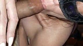 masked milf roughly sucks condom-covered cock pov