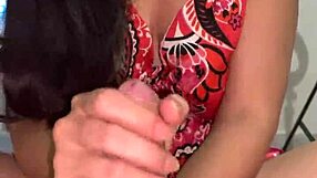 check out this brunette giving wellington prado a tasty handjob on his big cock in her pink outfit