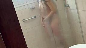 Ever caught this curly blonde latina influencer stroking huge cock in shower?