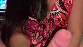 check out this brunette giving wellington prado a tasty handjob on his big cock in her pink outfit